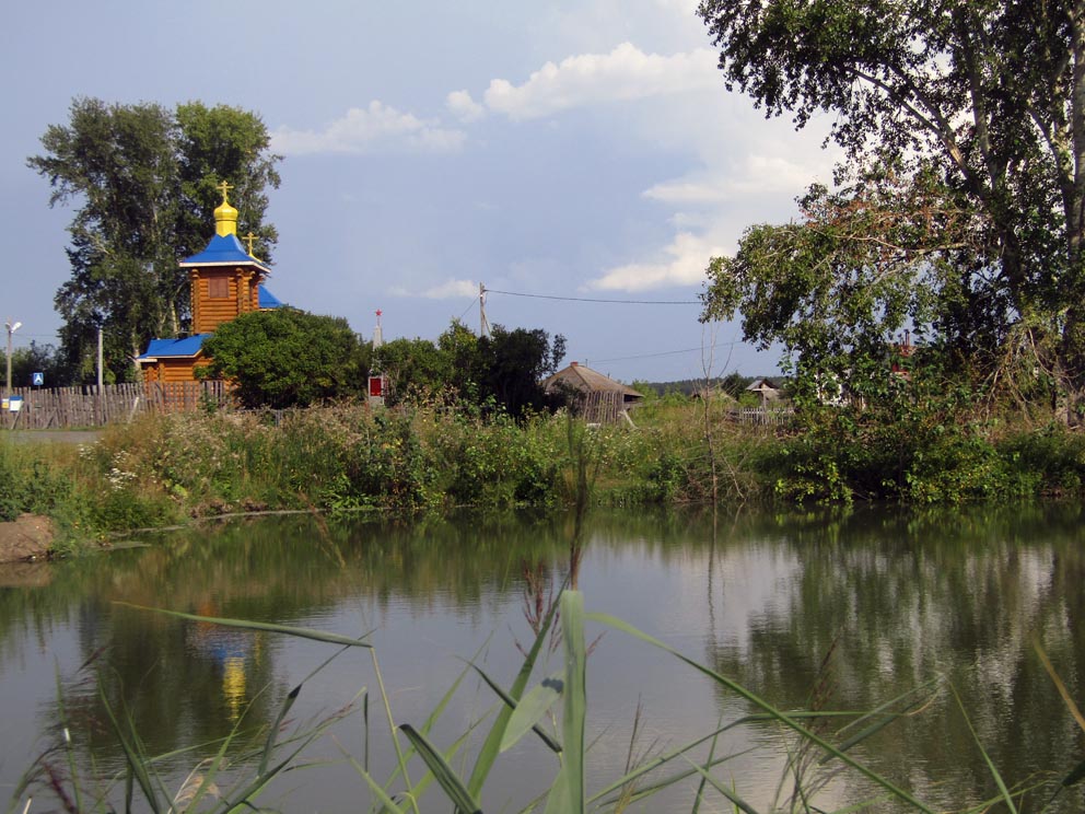 Сельский пейзаж с Ильинским храмом в Тимохинском